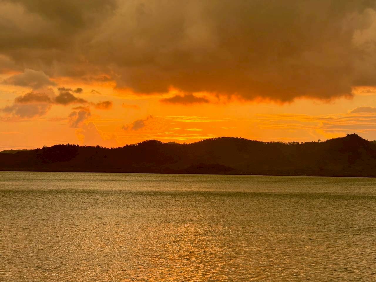 Fiery orange sunset skies over the Andaman coastline