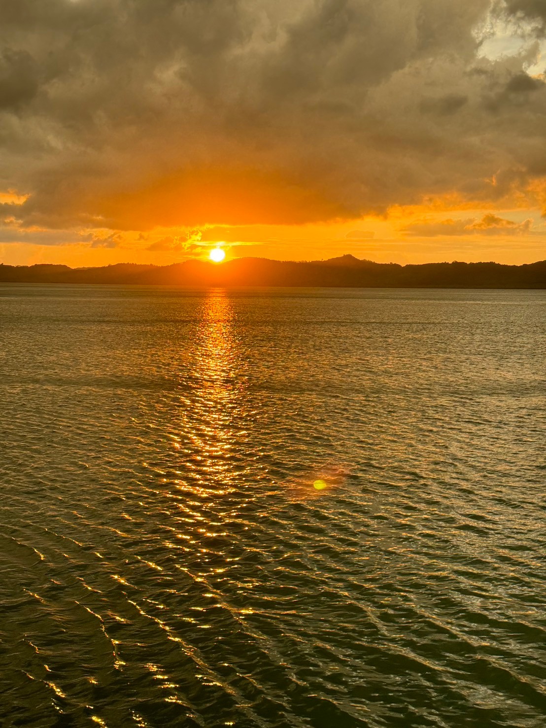 Golden sunset over Phang Nga Bay from the boat