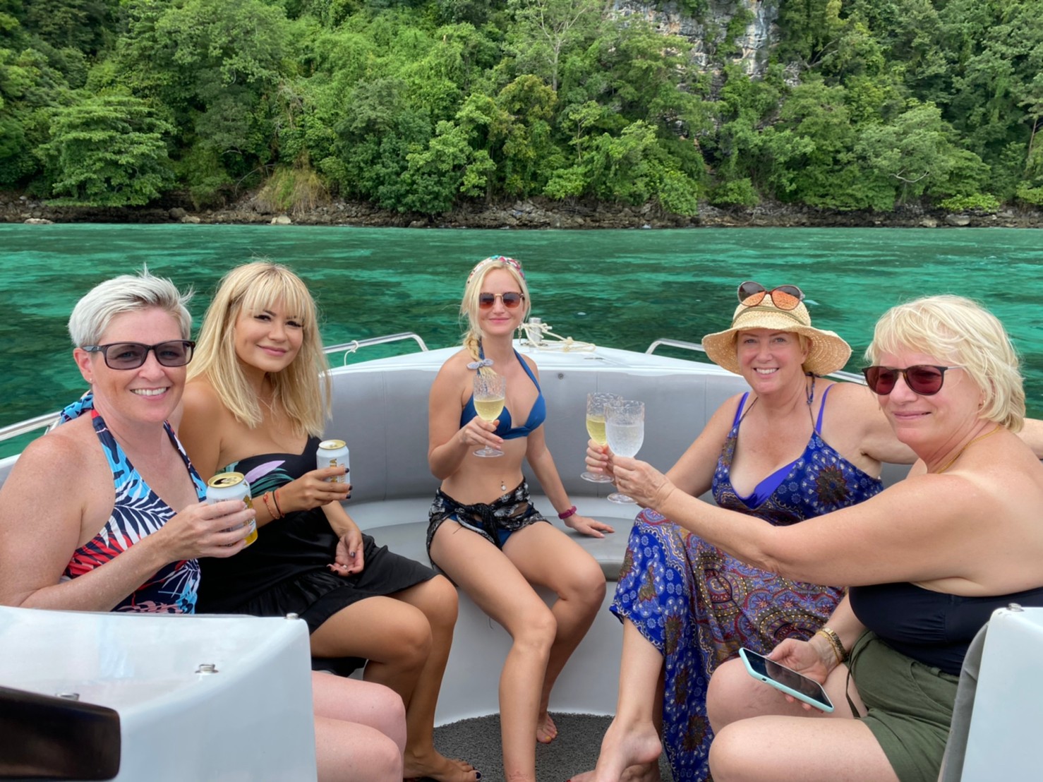 Guests toasting on the speedboat at Phi Phi Islands